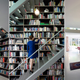 Illustration for article titled This Dream House Was Entirely Built Around a Giant Three-Story-High Bookshelf